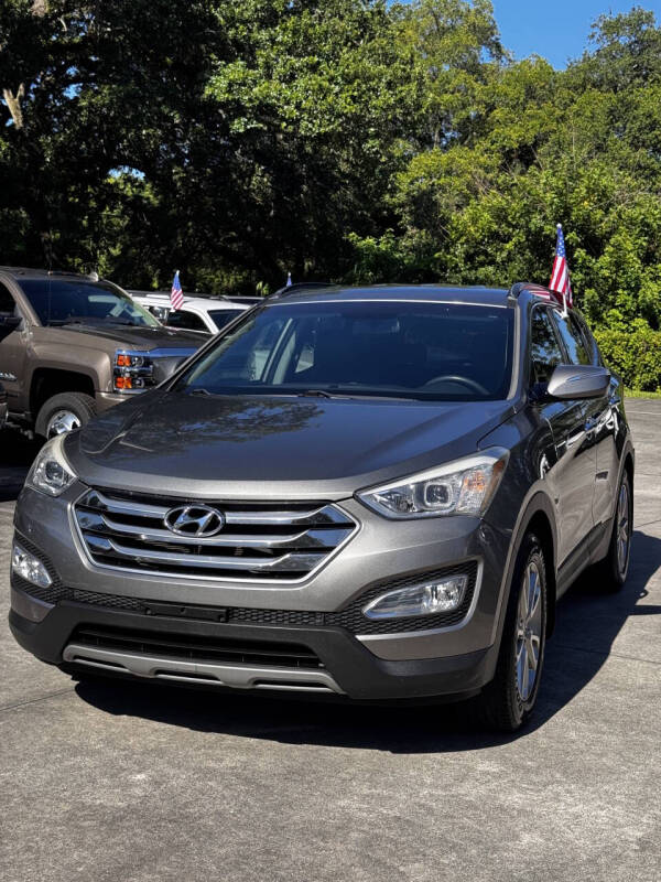 hyundai santa fe 2015 5XYZU3LA5FG242948 image hyundai santa fe 2015 5XYZU3LA5FG242948 image